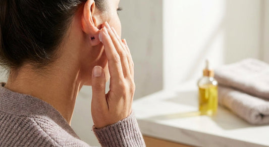 How to fade a dark piercing scar